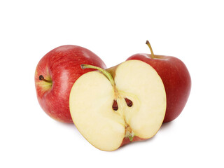Whole and cut apples on white background