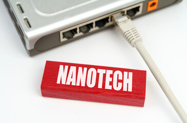There is a router connected to the network on the table, next to a plaque with the inscription -...