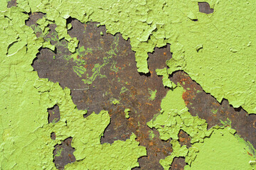 Old metal background with rust and cracked paint.