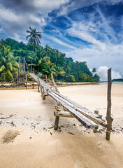 Fototapeta na wymiar Wooden bridge at Bang Bao beach in Koh Kood island, Trat, Thailand