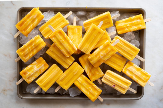 Mango Lassi Popsciles on marble surface