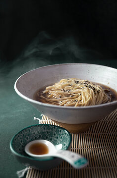 Hot japanese noodles ramen with broth dash or dashi and sesame.