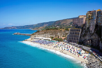 turquoise Tyrrhenian Sea and Rotonda Beach seen from the viewpoint of Sanctuary of Santa Maria dell'Isola in Tropea, Calabria, Italy