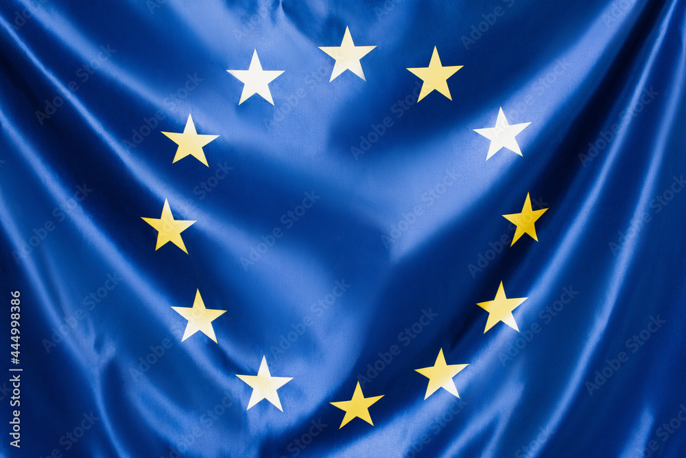 Wall mural close up of blue european union flag with yellow stars