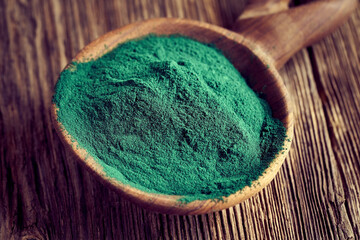 Fototapeta na wymiar Spirulina algae powder - healthy nutritional supplement