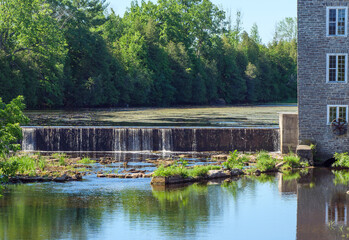 The weir at Spencerville Mill on the South Nation River in Spencerville, Ontario.