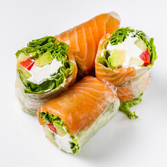 appetizing spring rolls with sea food and philadelphia cheese on a white background