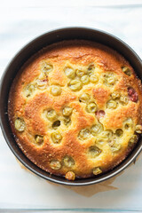 Gooseberry cake with icing sugar 