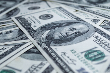 One hundred US dollars banknotes. Cash one hundred dollar bills, 100 dollars, Benjamin Franklin portrait, american currency exchange finance.