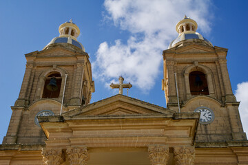 Fototapeta na wymiar DINGLI, MALTA - 02 JAN, 2020: Old, historic and authentic Christian chapel St. Mary's Parish Church in Dingli with blue sky in the background on a sunny winter day