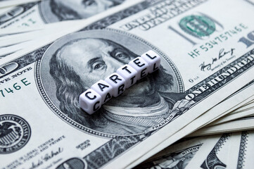 One hundred US dollars banknotes. Cartel word in cubes. Cash one hundred dollar bills, 100 dollars, Benjamin Franklin portrait, american currency exchange finance.