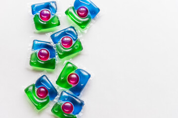 washing pods on white background, close up, abstract color background.liquid detergent,capsules...