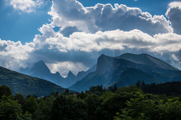 Mountain scenery under the cloudy blue sky