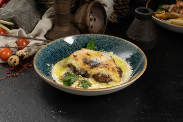 Pork and beef with mozzarella cheese and mashed potatoes