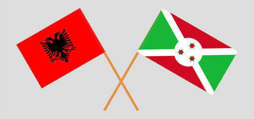 Crossed flags of Albania and Burundi. Official colors. Correct proportion