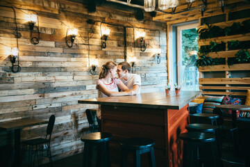 guy and a girl meeting in a city cafe