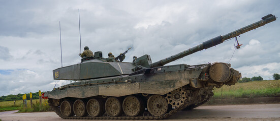 British army FV4034 Challenger 2 main battle tank in action on a military combat exercise,...