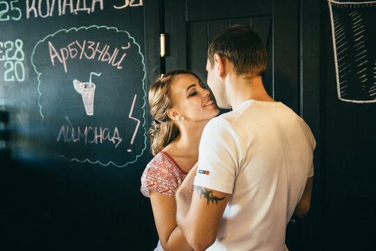 Guy And A Girl Meeting In A City Cafe