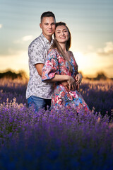 Beautiful young couple in lavender