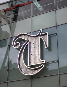 leeds, west yorkshire, united kingdom - 7 july 2021: the logo above the entrance or the trinity shopping centre in briggate leeds