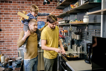 Gay Man Cooking Breakfast for Family