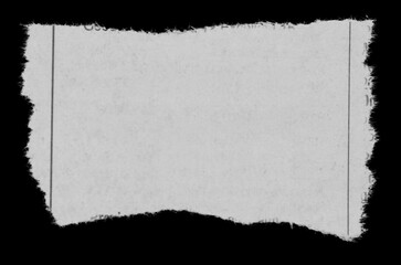Torn paper on black