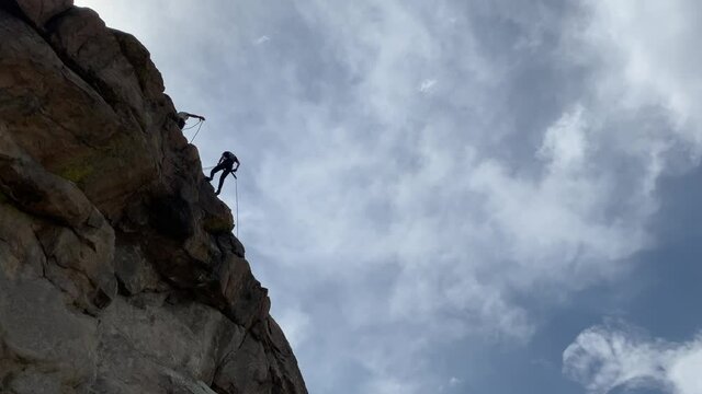 rappelling down a cliff in Colorado