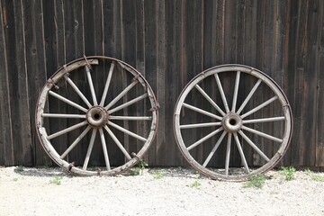 Fototapeta na wymiar Two Old Wagon Wheels in Wyoming