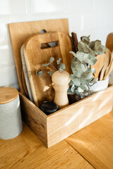 kitchen details, accessories, ceramic jars, wooden table, white ceramic brick wall background....