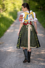 Beautiful woman wearing traditional slovak folk dress