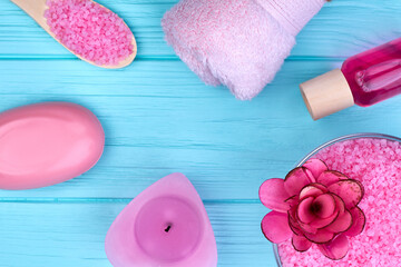 Obraz na płótnie Canvas Vertical shot flat lay pink accessories for bath and spa.