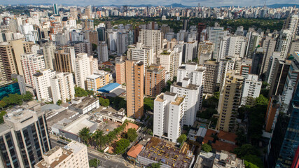 Fototapeta na wymiar Aerial view of the Itaim Bibi region, with Av. Paulista and Ibirapuera Park in the background