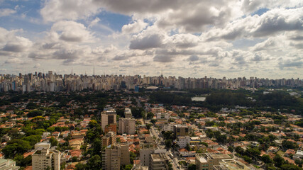 Fototapeta premium Aerial view of the Itaim Bibi region, with Av. Paulista and Ibirapuera Park in the background