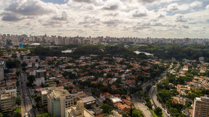 Fototapeta premium Aerial view of the Itaim Bibi region, with Av. Paulista and Ibirapuera Park in the background