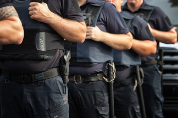 Soldiers security in the ranks, ammunition equipment and weapons, with a shallow depth of field