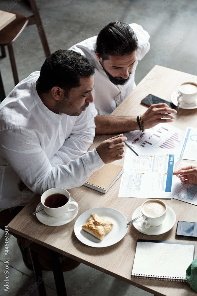 Poster middle eastern men working with data