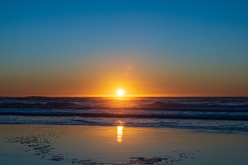 The blue sky, the sunset and the sea.
