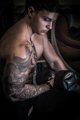 boy does sports in a fitness club