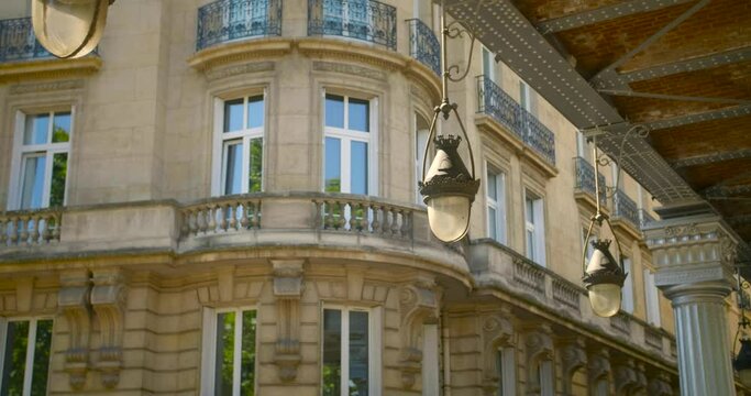 Vintage Lamp Hanging On The Roof Of Bir-Hakeim Bridge, Formerly The Bridge Of Passy, In Paris, France At Daytime. low angle