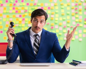 Businessman with many conflicting priorities