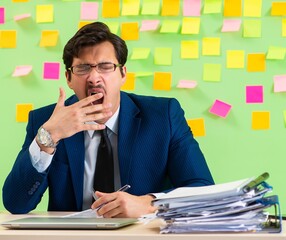 Businessman having trouble with his priorities