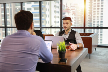 Multiethnic business people discussing company about new project in meeting room with smiling and happy faces