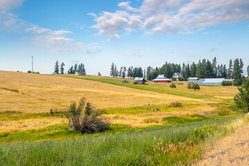 A ranch farm with Victorian estate home, barns, and shops in the Palouse region near Spokane,...