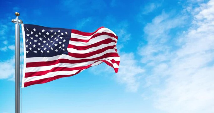 The national flag of the United States of America waving in the wind.