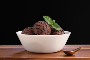 chocolate ice cream in white bowl on cutting board