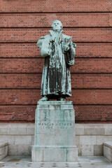 Statue of Martin Luther at one side of the St. Michaelis Church in Hamburg, Germany