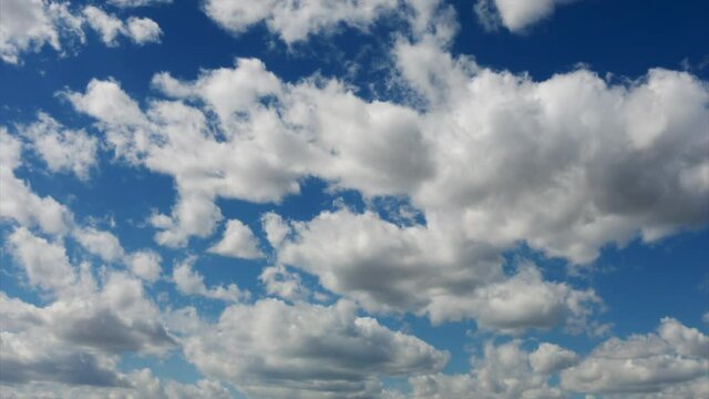 Qualitative time lapse of blue sky and clouds. No flicker, no birds.