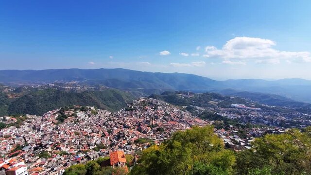 Taxco city lookout with Jesus Christ monument (Cristo Rey) overlooking scenic hills and historic city center.