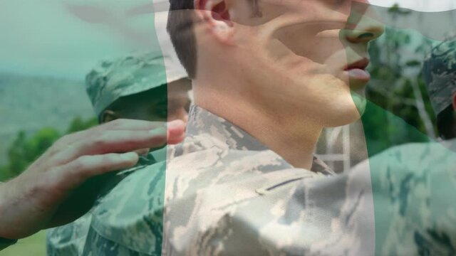 Digital composition of waving nigeria flag against troops of soldiers making a pledge