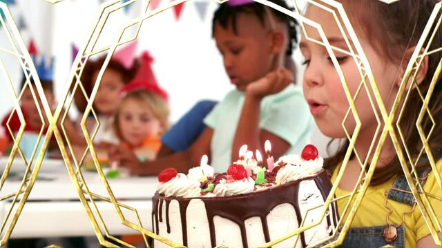 Animation of gold pattern over children at birthday party